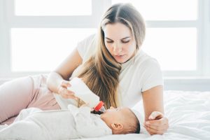 mother feeding newborn